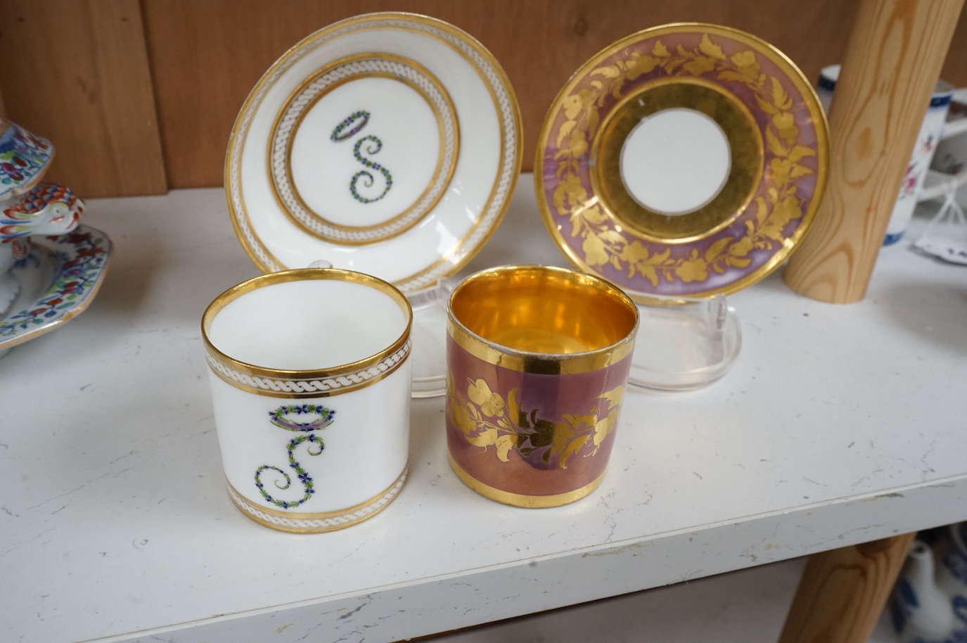 Two 19th century Paris porcelain coffee cans and saucers, cans 6cm high.